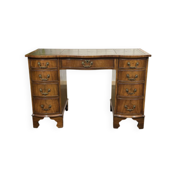 English desk from the 1950s in mahogany with a leather top.