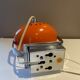 Orange eye ball wall lamp