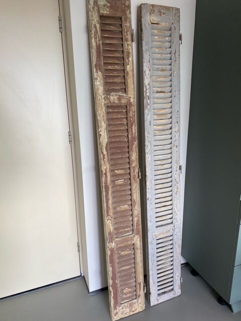 Old wooden french louvre shutters