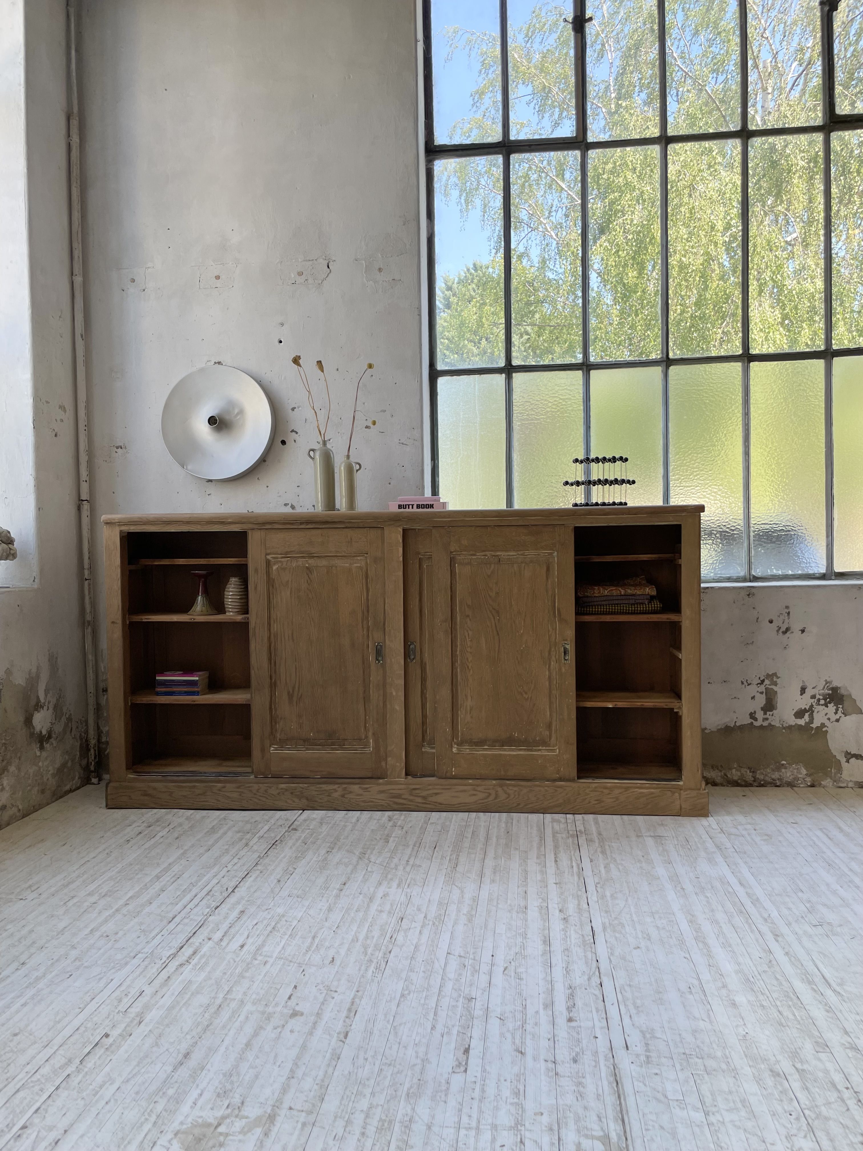 Large row of solid oak loom sliding doors