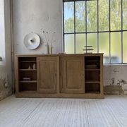 Large row of solid oak loom sliding doors