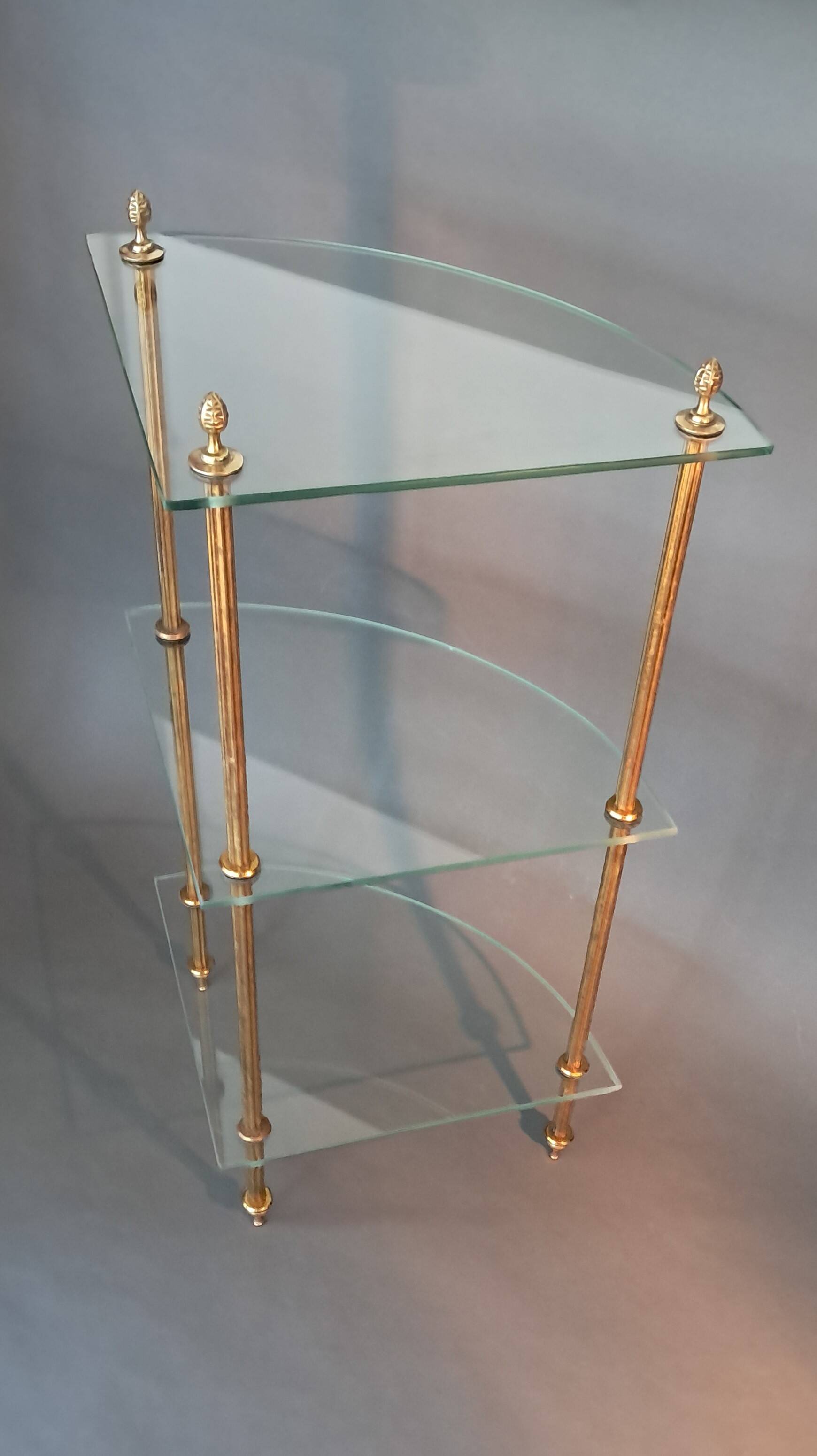 Neoclassical style 3-shelf corner cupboard in gilded brass, Circa 1950/1960.