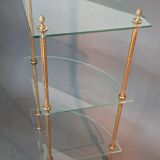 Neoclassical style 3-shelf corner cupboard in gilded brass, Circa 1950/1960.