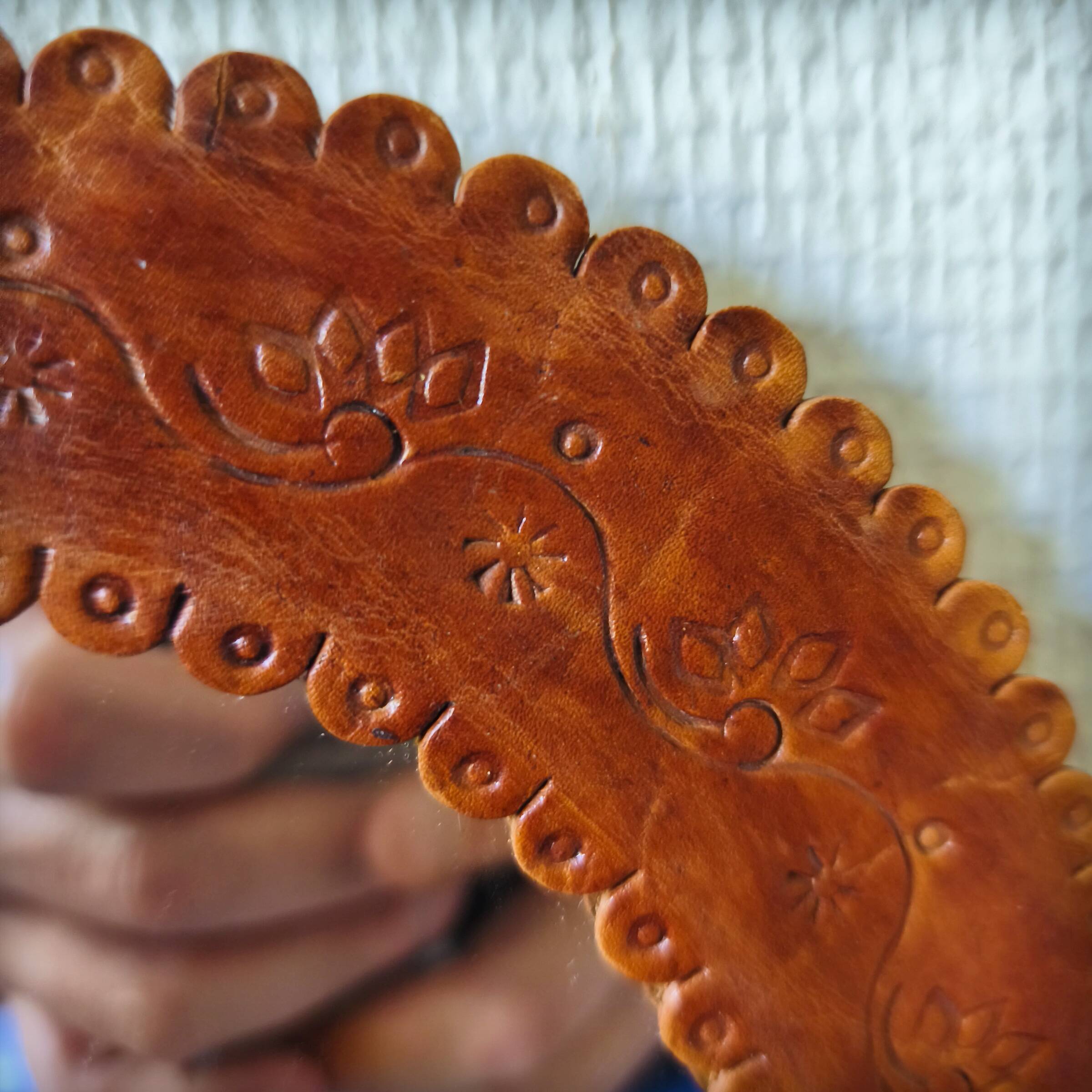 Leather repoussé mirror, Sri Lanka, 1960s