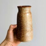 Spotted ceramic vase, rustic design.