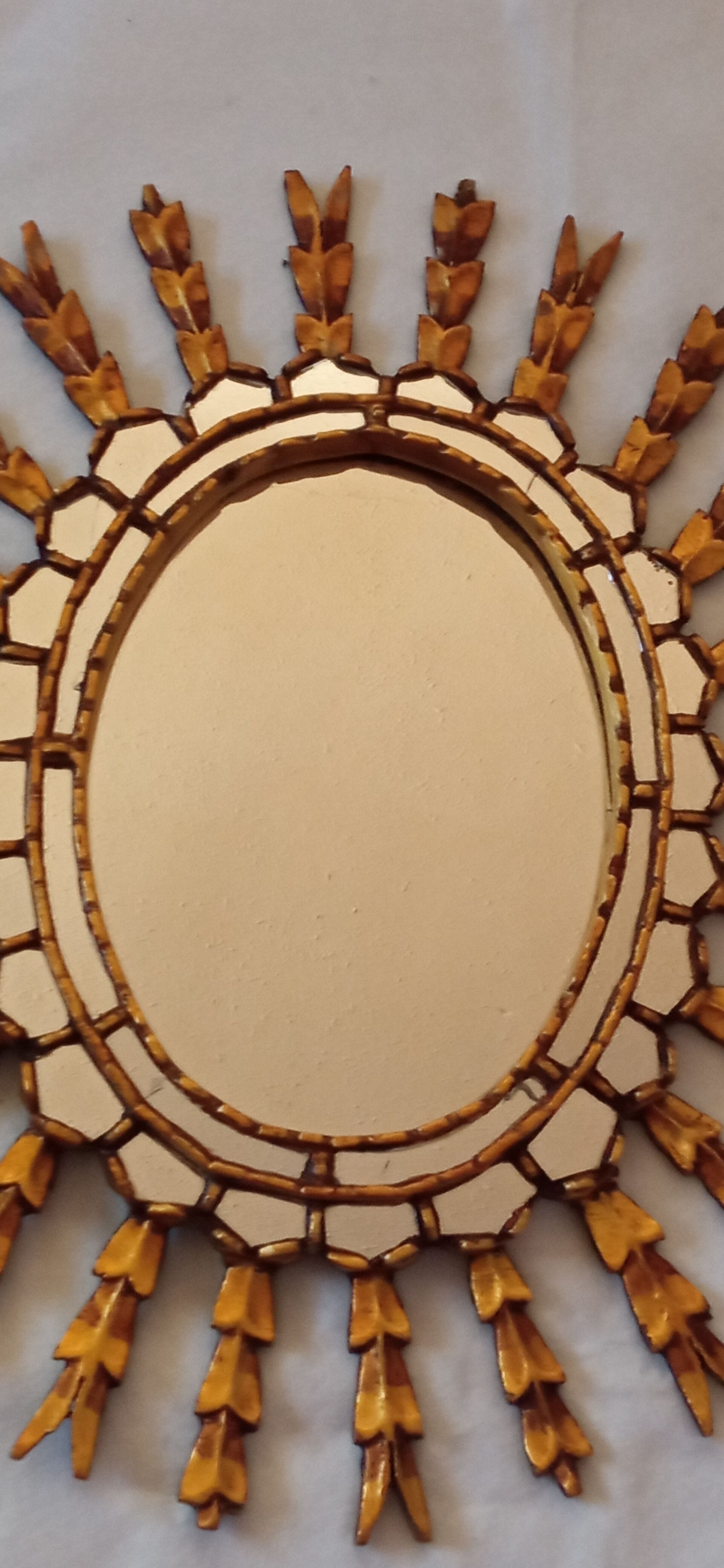 Sun mirror in gilded wood, 60x52 cm