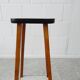 Plant stand made of wood and formica with two shelves, flower column