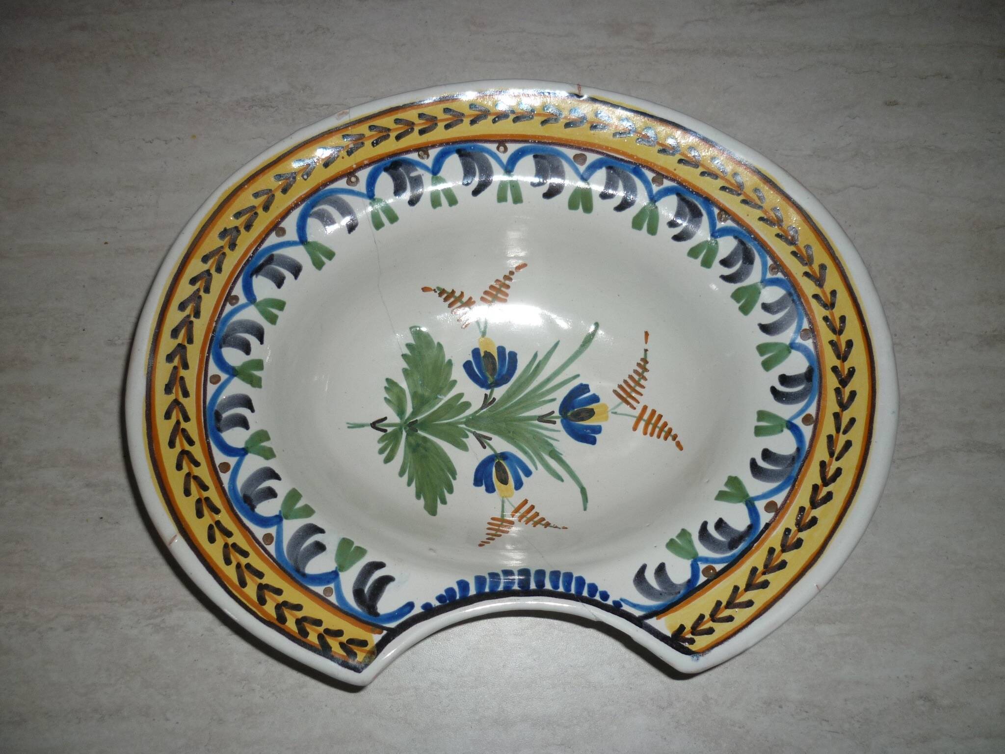 Old beard dish repair with staples