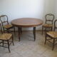 Table Louis Philippe et 4 chaises paillées noyer