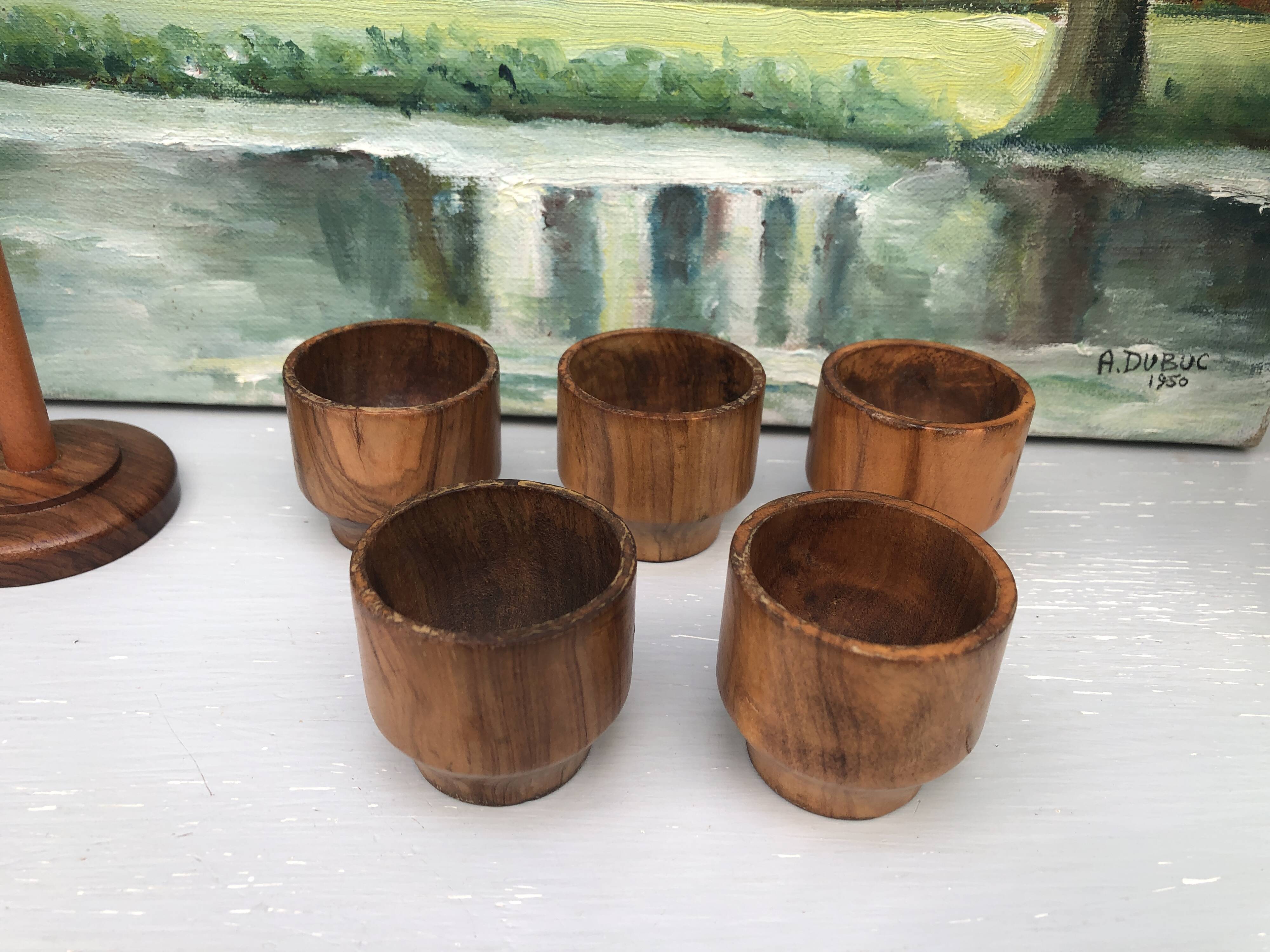 Five olive wood egg cups