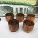 Five olive wood egg cups