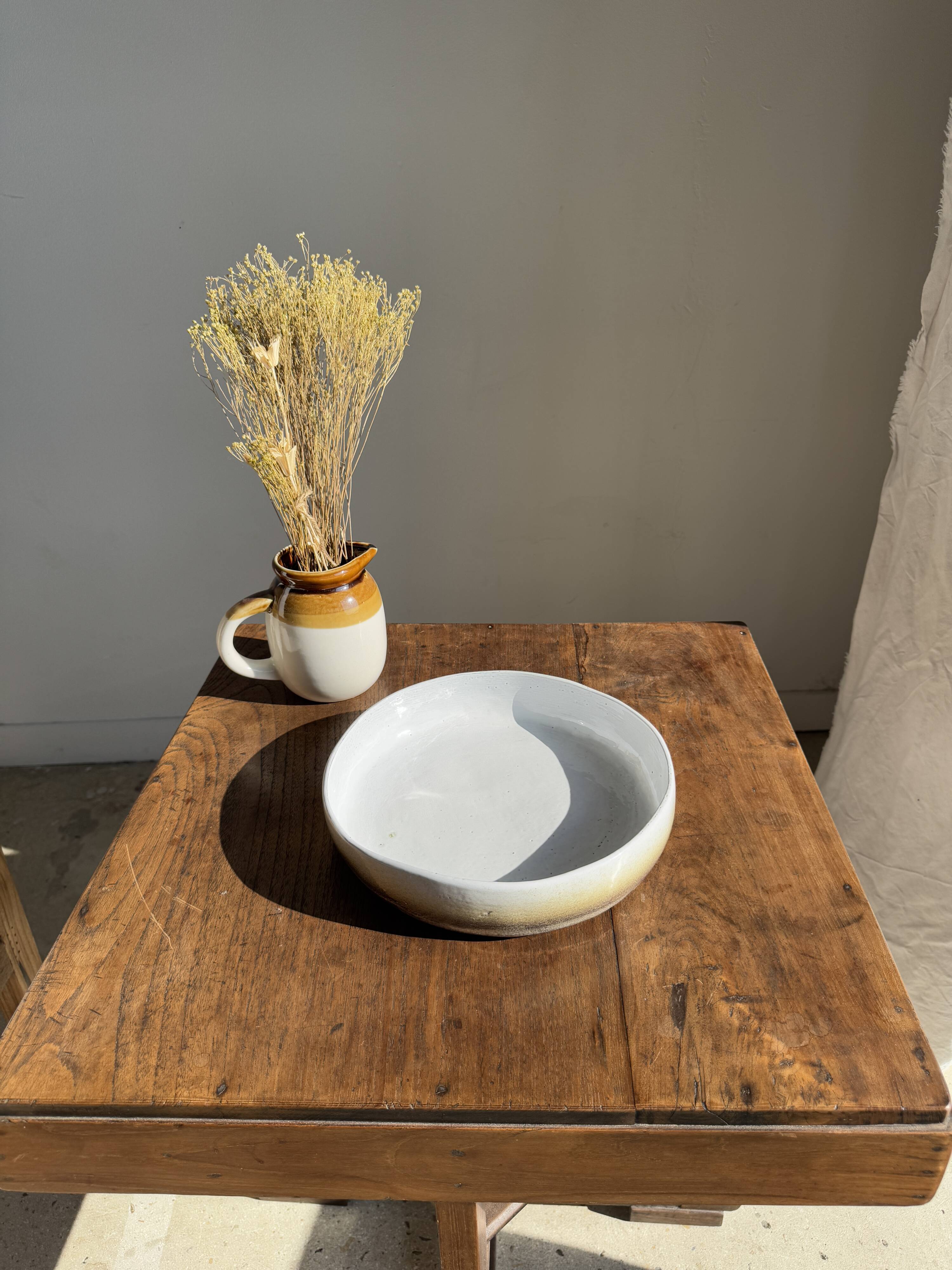Large white and earthenware ceramic dish