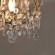 brass cage chandelier with crystal tassels