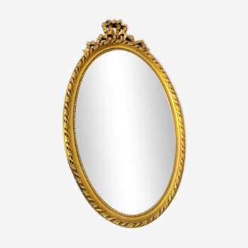 Miroir en bois ovale et doré style rococo 42x73cm