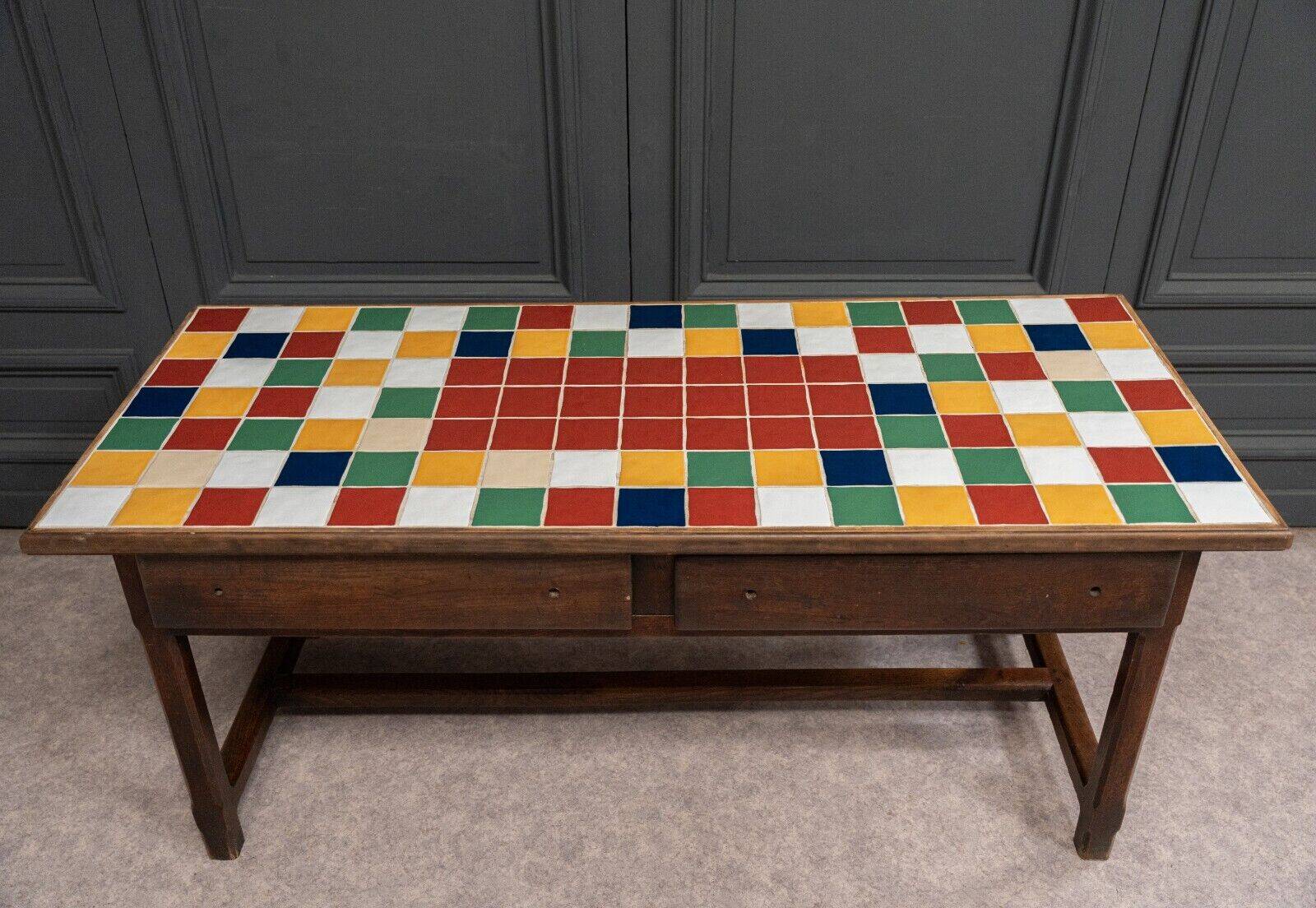 19th century oak farm table with multi-colored ceramic tiles