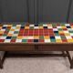 19th century oak farm table with multi-colored ceramic tiles