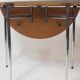 Table en formica ronde pliante et sa chaise