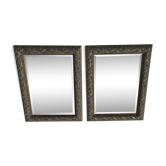 Pair of bevelled mirrors in white and gilded wood 86 x 66 cm