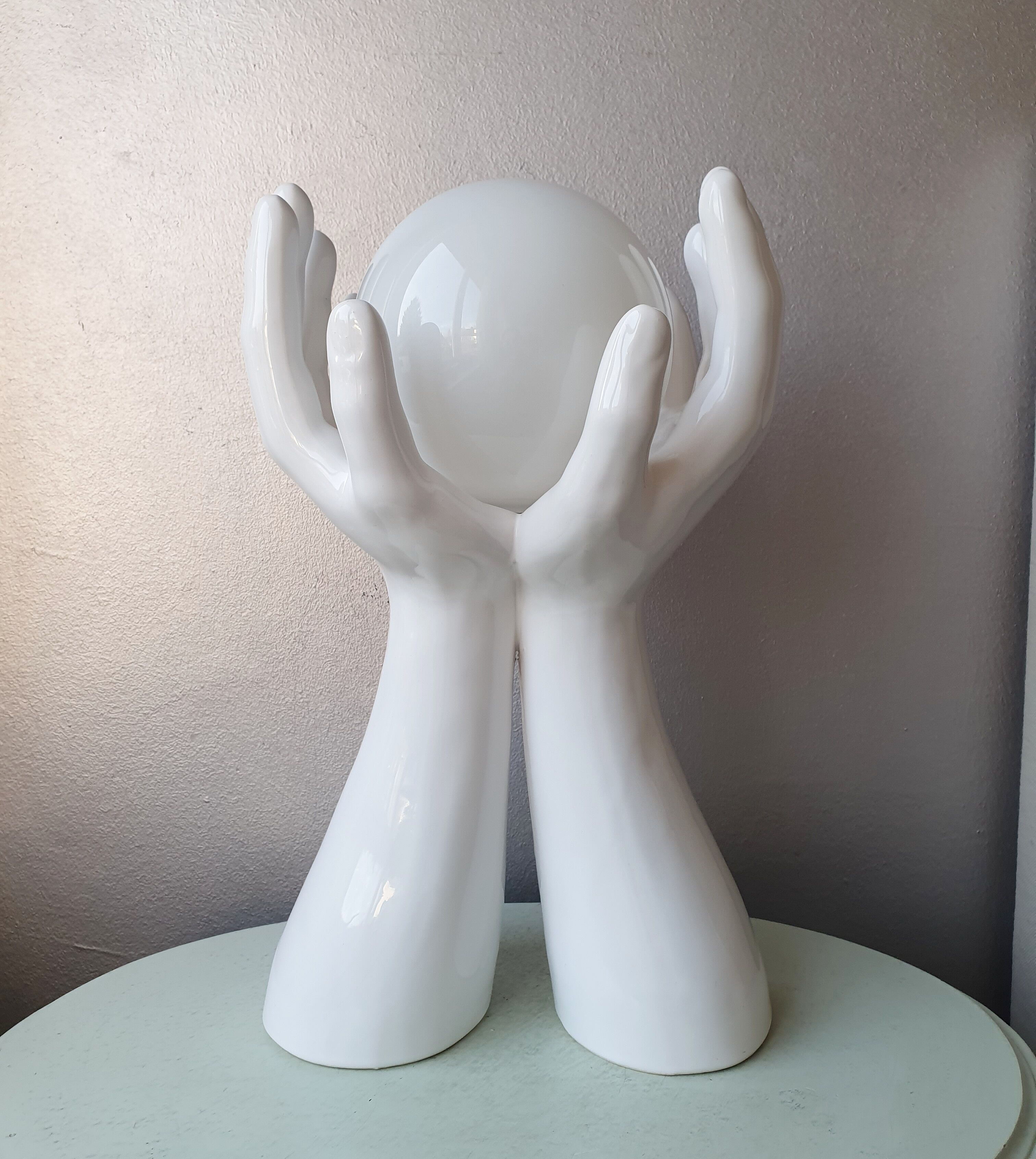 Italian design ceramic table lamp two hands and a glass sphere