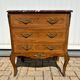 Marquetry commode in transitional style
