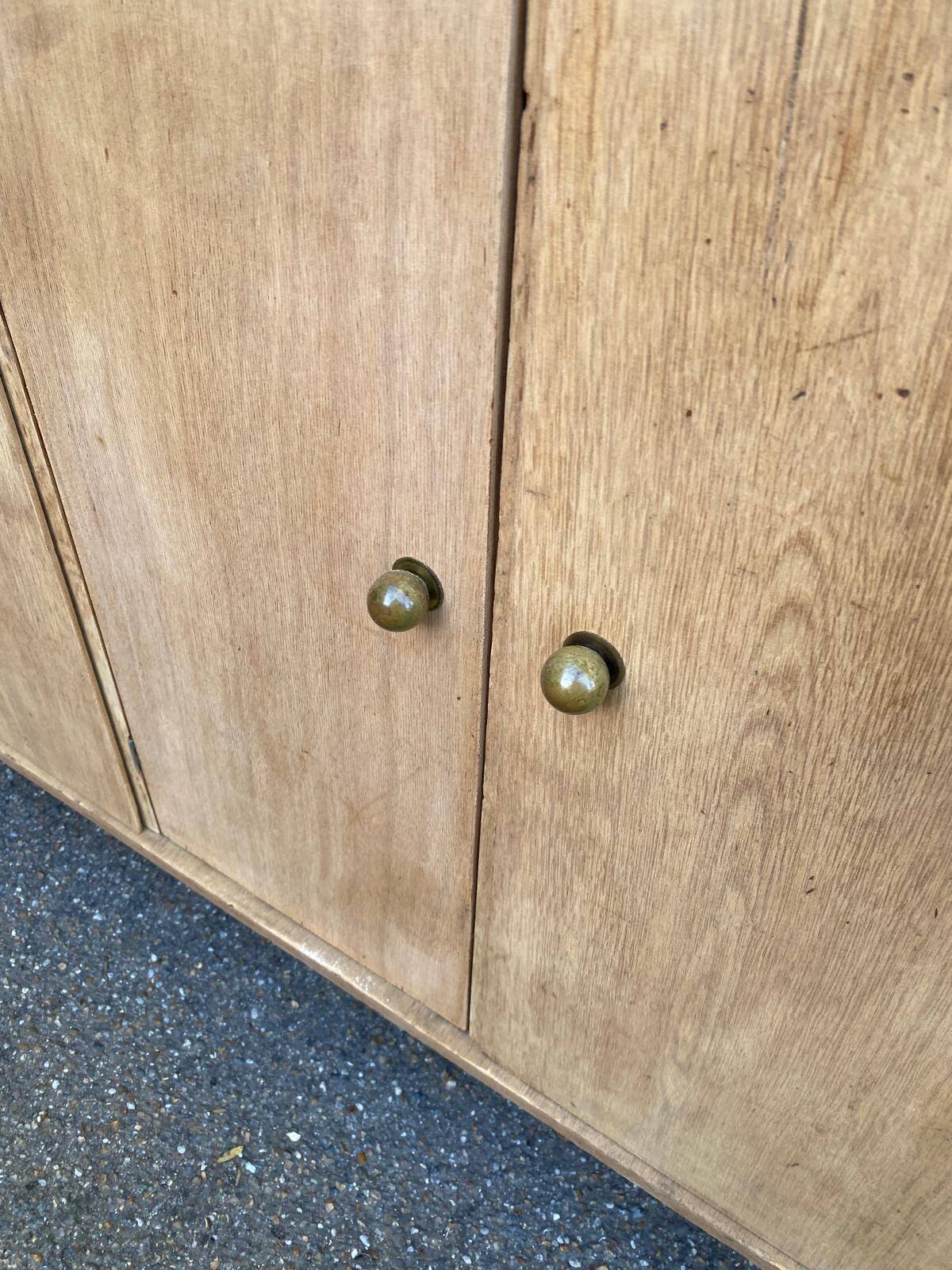 Vintage 1950s oak enfilade buffet with tapered legs.