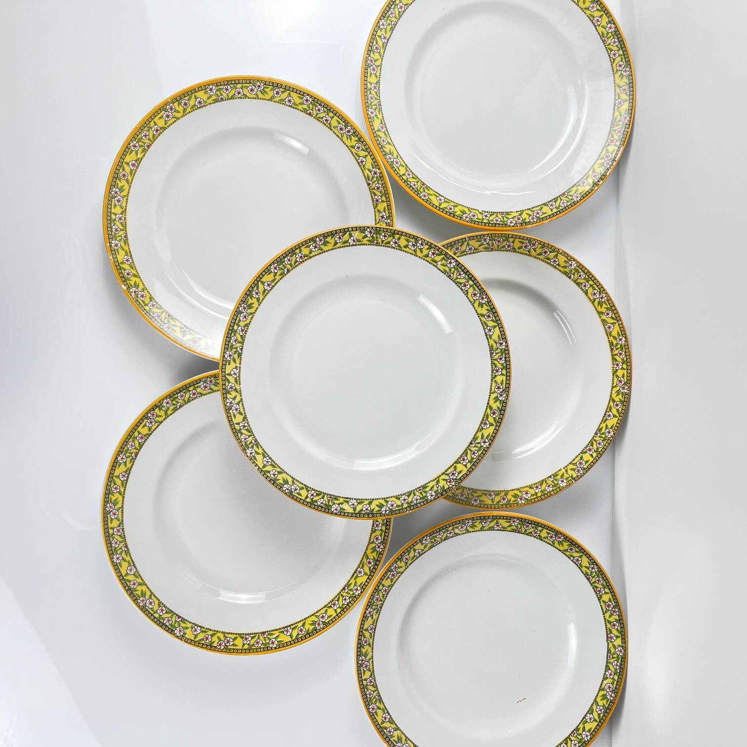 Set of 6 "Yvonne" iron earth plates, Orchies, early 20th century