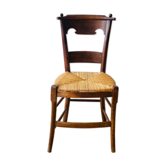 Antique wooden chair and mulched seat