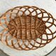 trio of woven rattan and bamboo baskets from the 60s and 70s