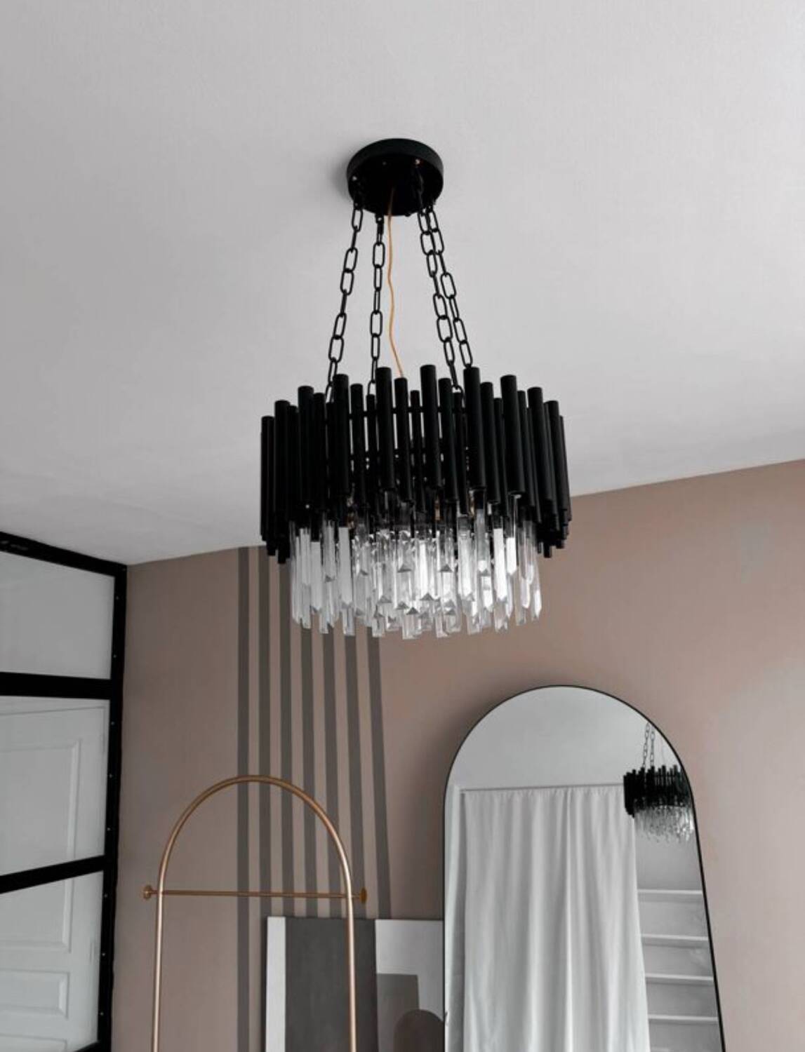 Modern designer chandelier in glass and metal