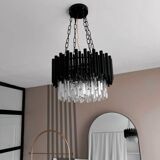 Modern designer chandelier in glass and metal
