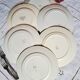 Old mismatched earthenware dinner plates