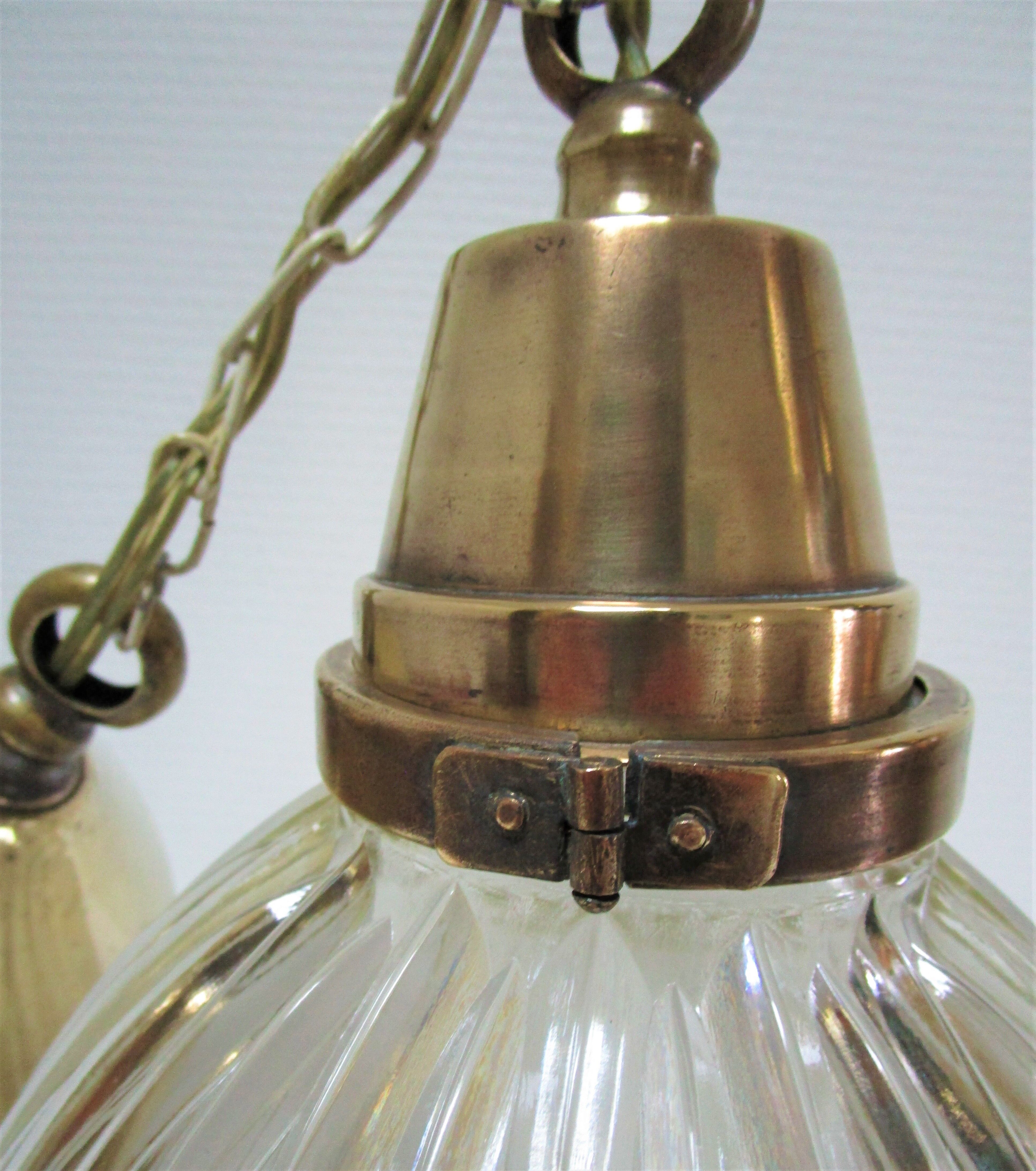 Holophane glass suspension and vintage patinated brass