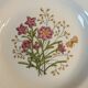 7 assiettes creuses CBM, décor champêtre floral et papillon, 1988