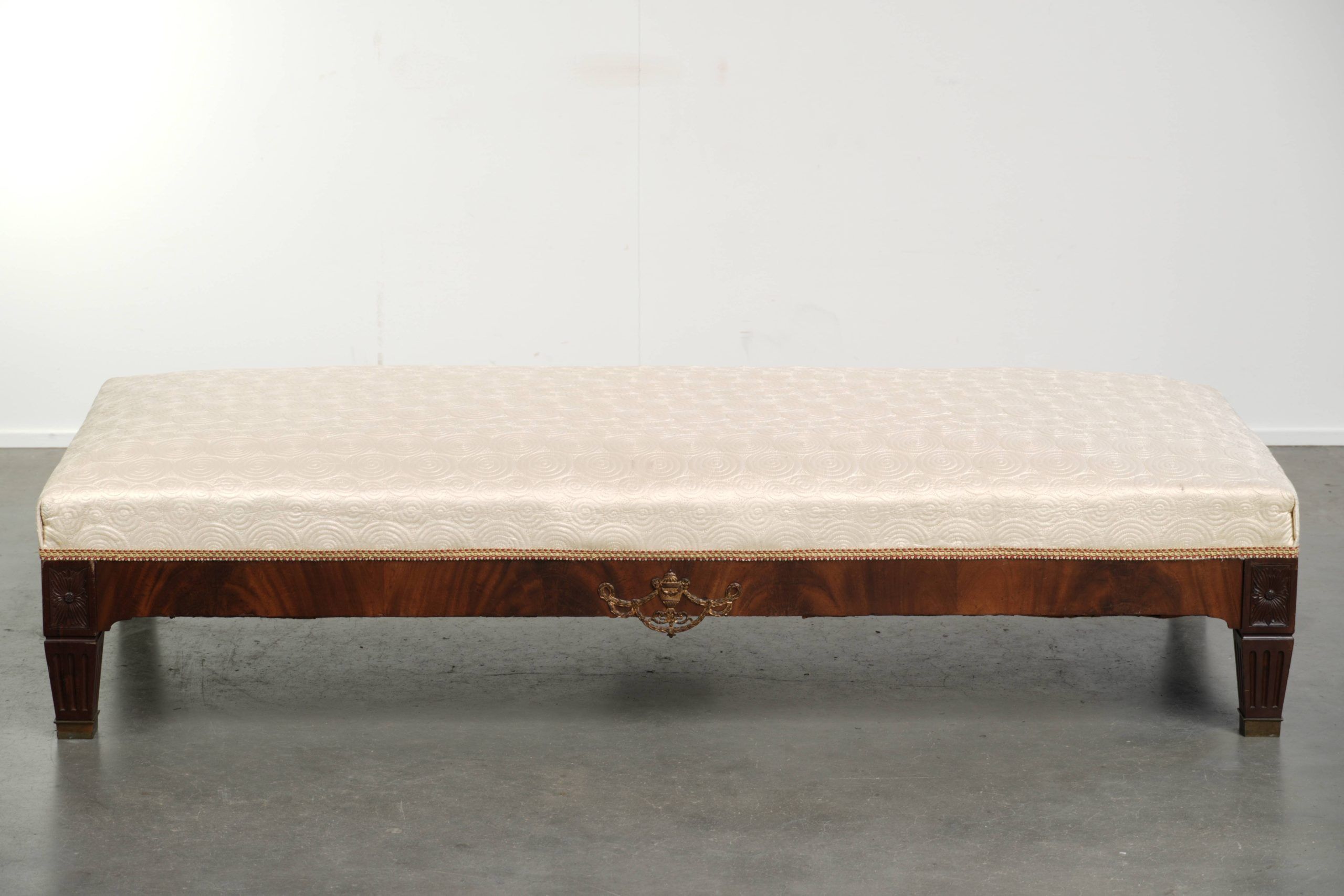 Antique French sofa from the 19th century in Empire style with a silk seat