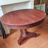 Round table with central tripod leg