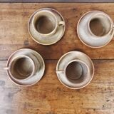 4 sandstone cups with under cups