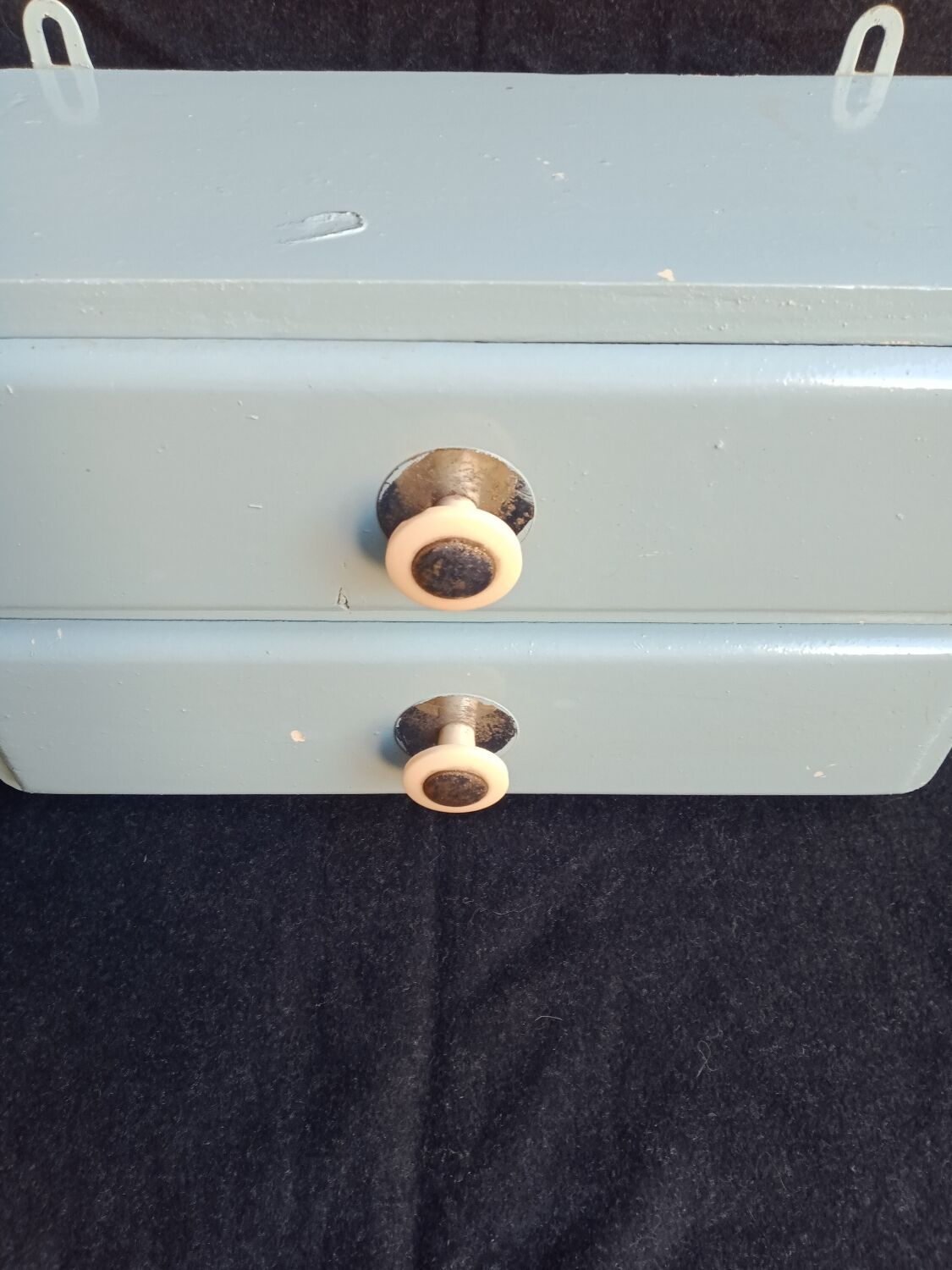 Wall-mounted storage unit with two drawers