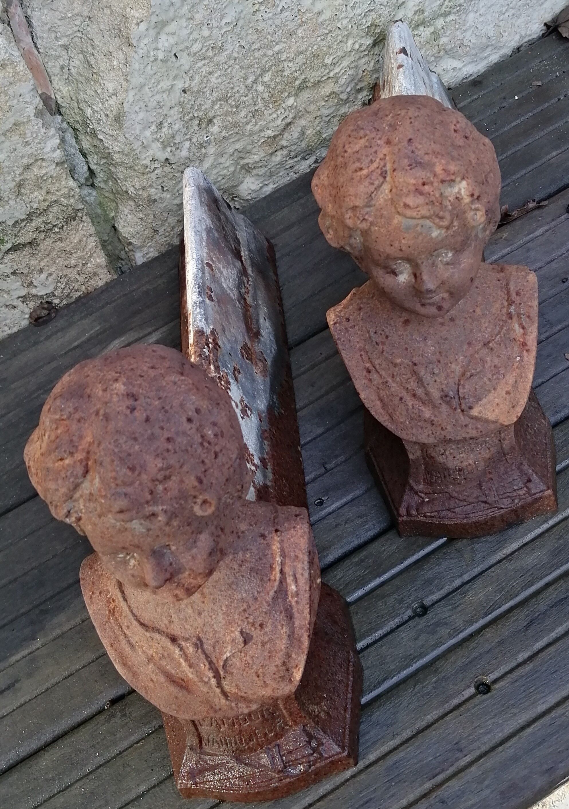 Pair of cast iron fireplace chenets "Children"