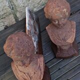 Pair of cast iron fireplace chenets "Children"