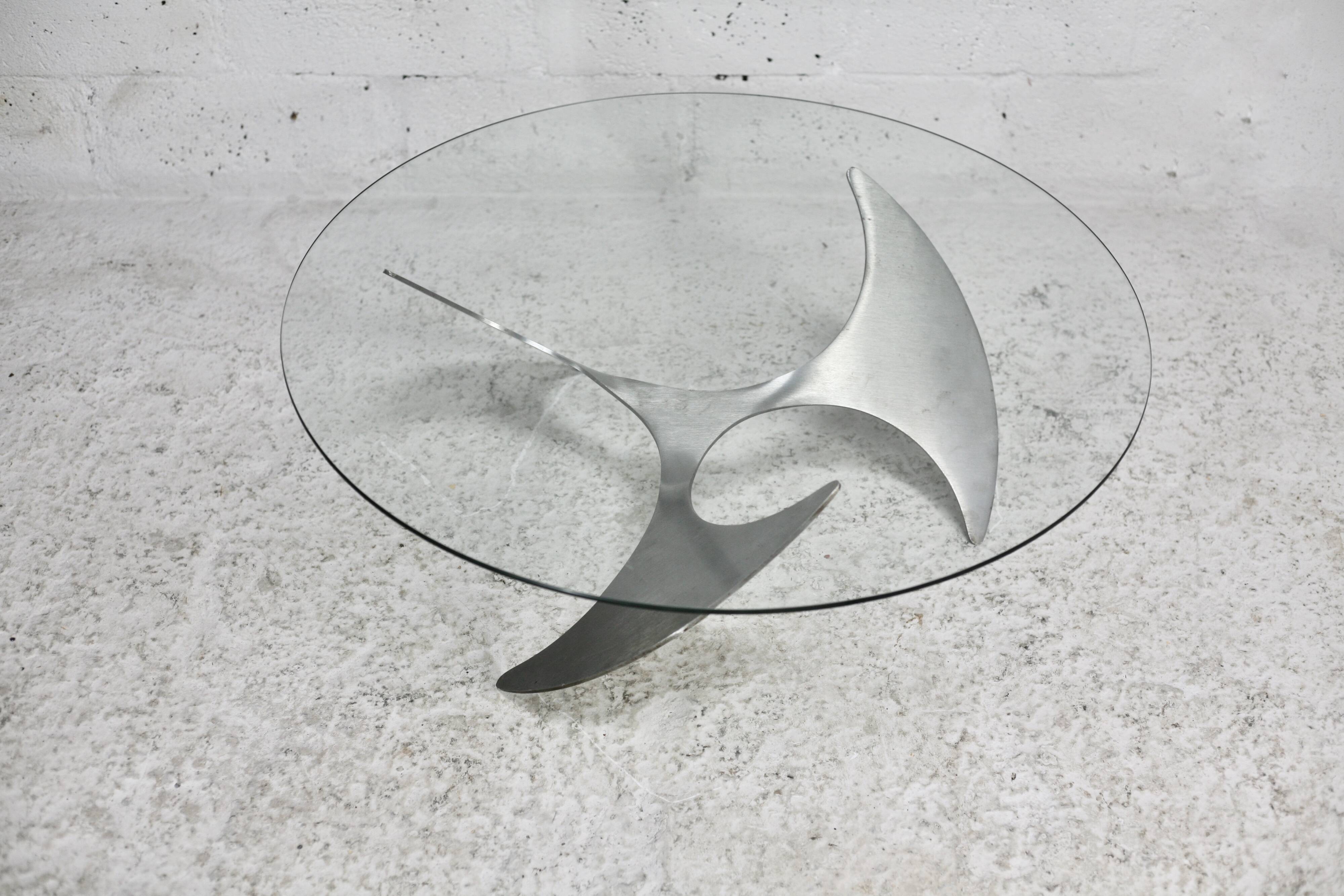 "space age" coffee table. Steel legs, glass slab. Circa 1970