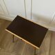 Vintage bedside table with compass feet