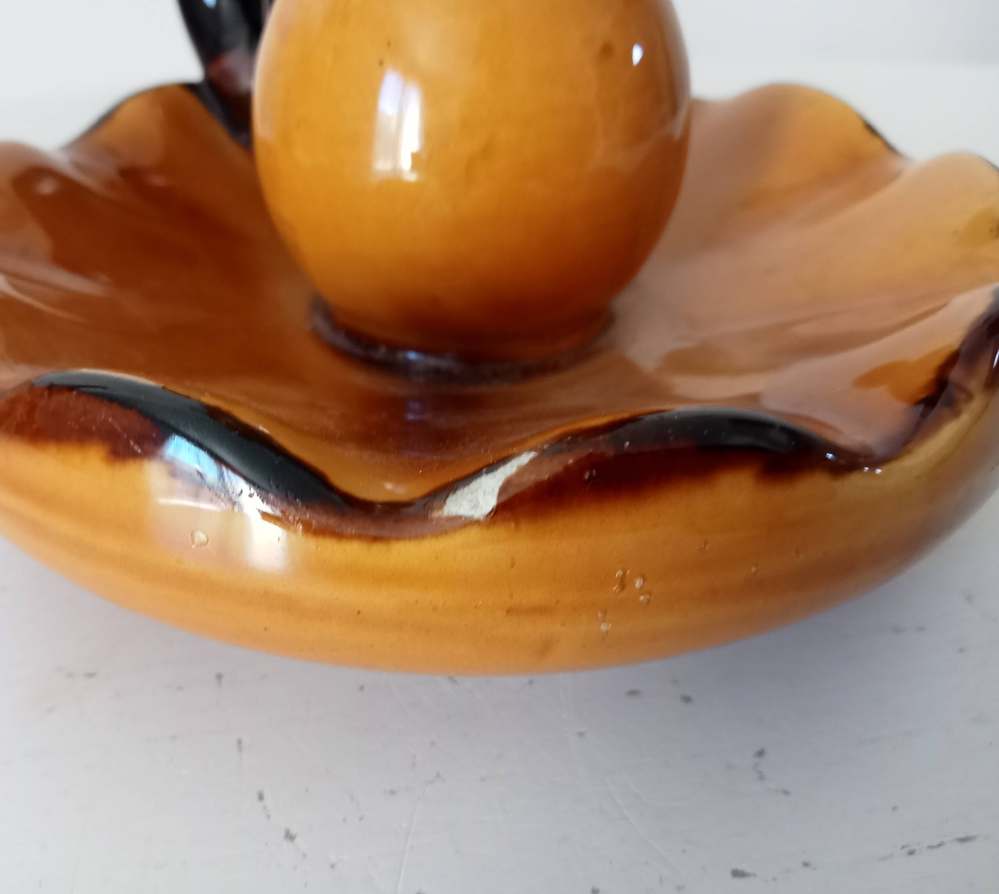 Vintage hand-held candlestick in glazed ceramic