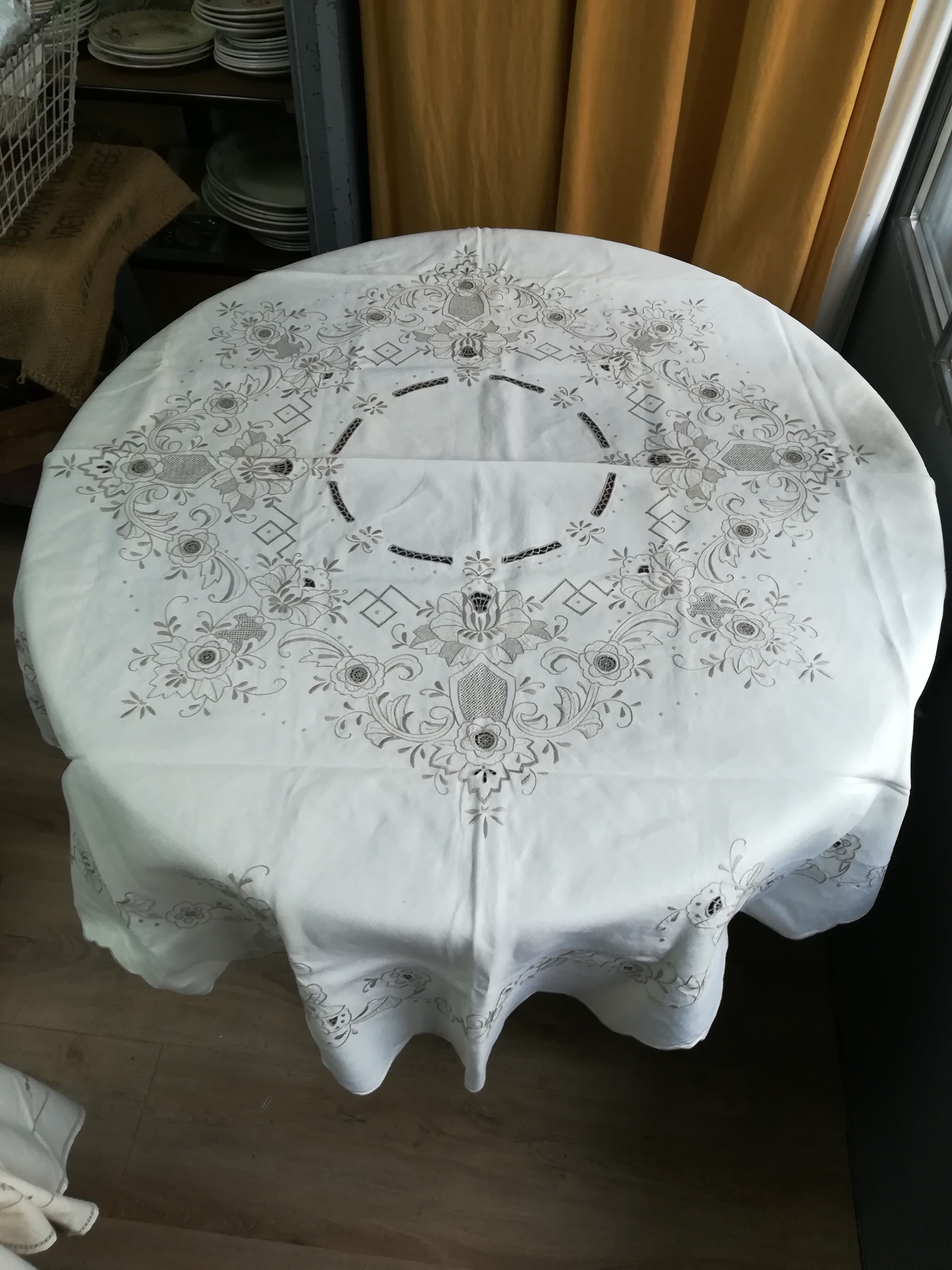 Round off-white tablecloth embroidered with grey flowers with 8 matching napkins - festive table