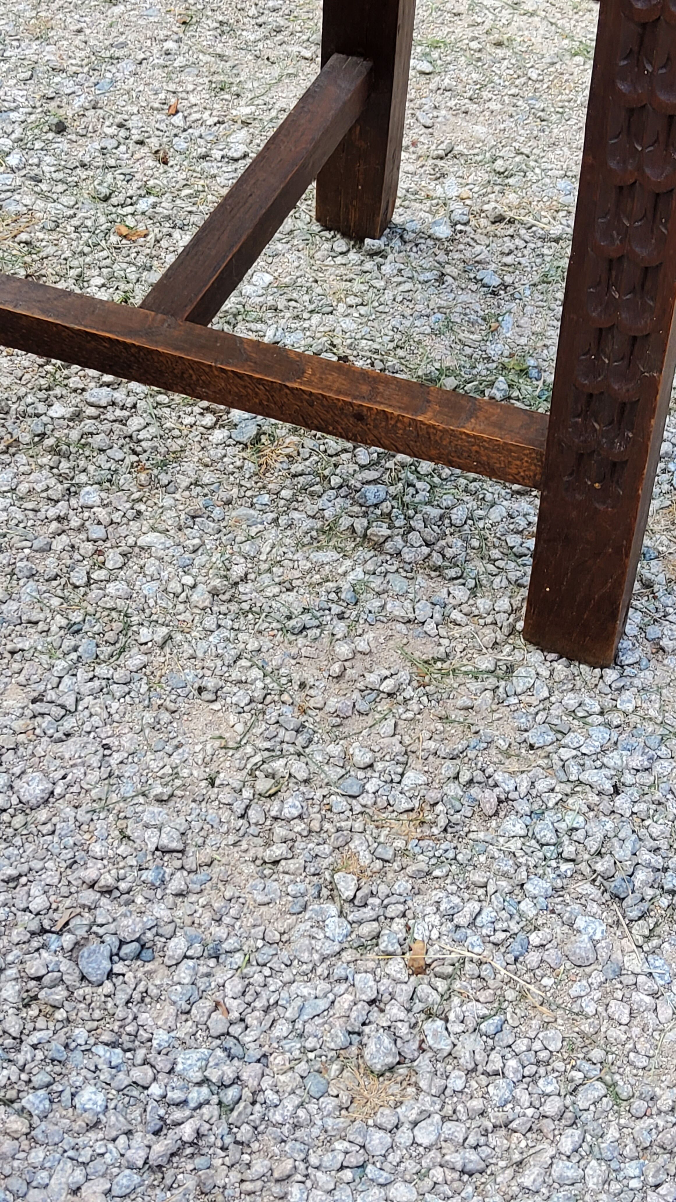 Set of three brutalist tripod armchairs in carved solid oak