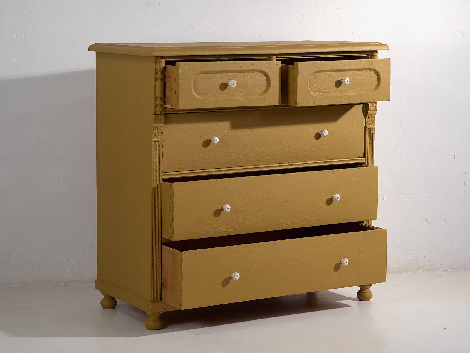 Large antique mustard-colored chest of drawers (circa 1920)