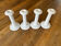 Lot de 4 bougeoirs en céramique blanche