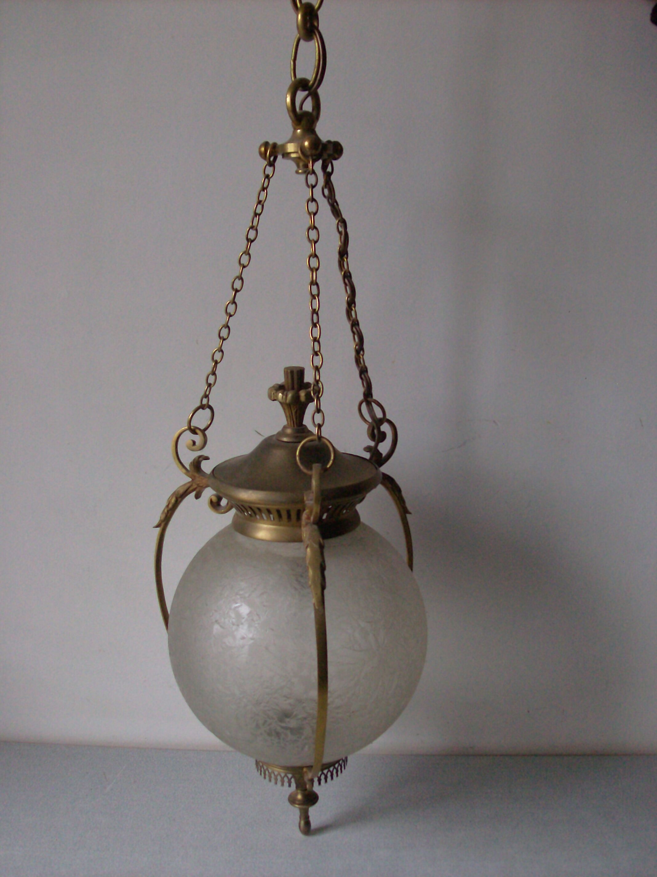 Suspension in bronze and engraved glass