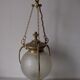 Suspension in bronze and engraved glass