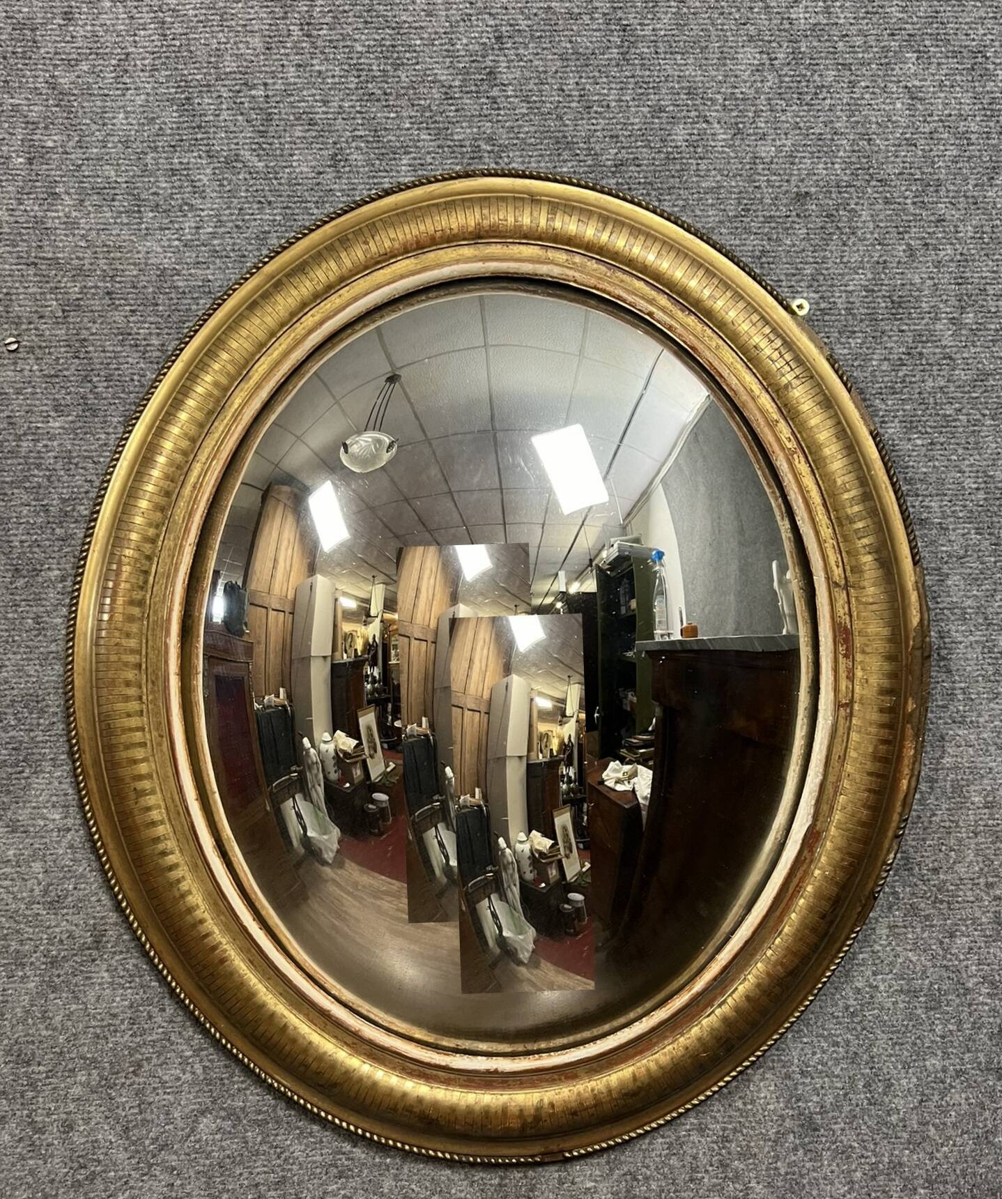 Oval mirror called “witch’s eye” in gilded wood in Louis XVI style circa 1850