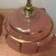 Pair of white ceramic wall lights with pink glass